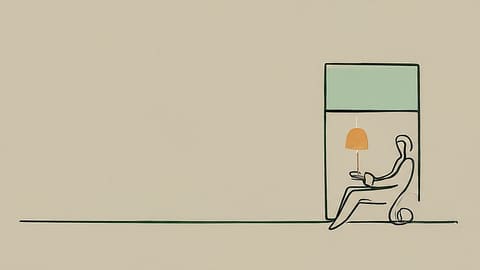 Figure sitting by window at night in contemplative peace